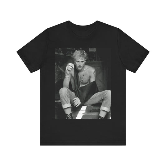 A black graphic t-shirt featuring a 90s-style graphic of Layne Staley from Alice In Chains, possibly a portrait or performance image.