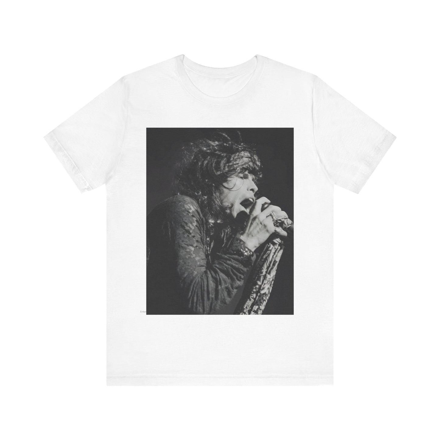 A black graphic t-shirt featuring a retro 70s-style illustration or photo of Aerosmith, designed to evoke their 'On Tour' presence, possibly with band members on stage or tour bus imagery.