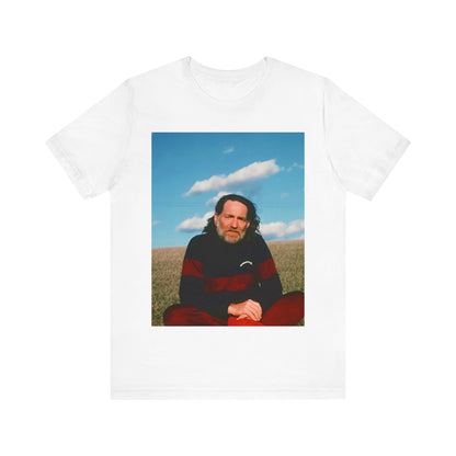 A black graphic t-shirt featuring a classic outlaw country graphic of Willie Nelson.