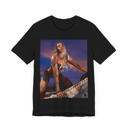 A black graphic t-shirt featuring a vintage graphic related to Tinashe's 'Nasty' era.