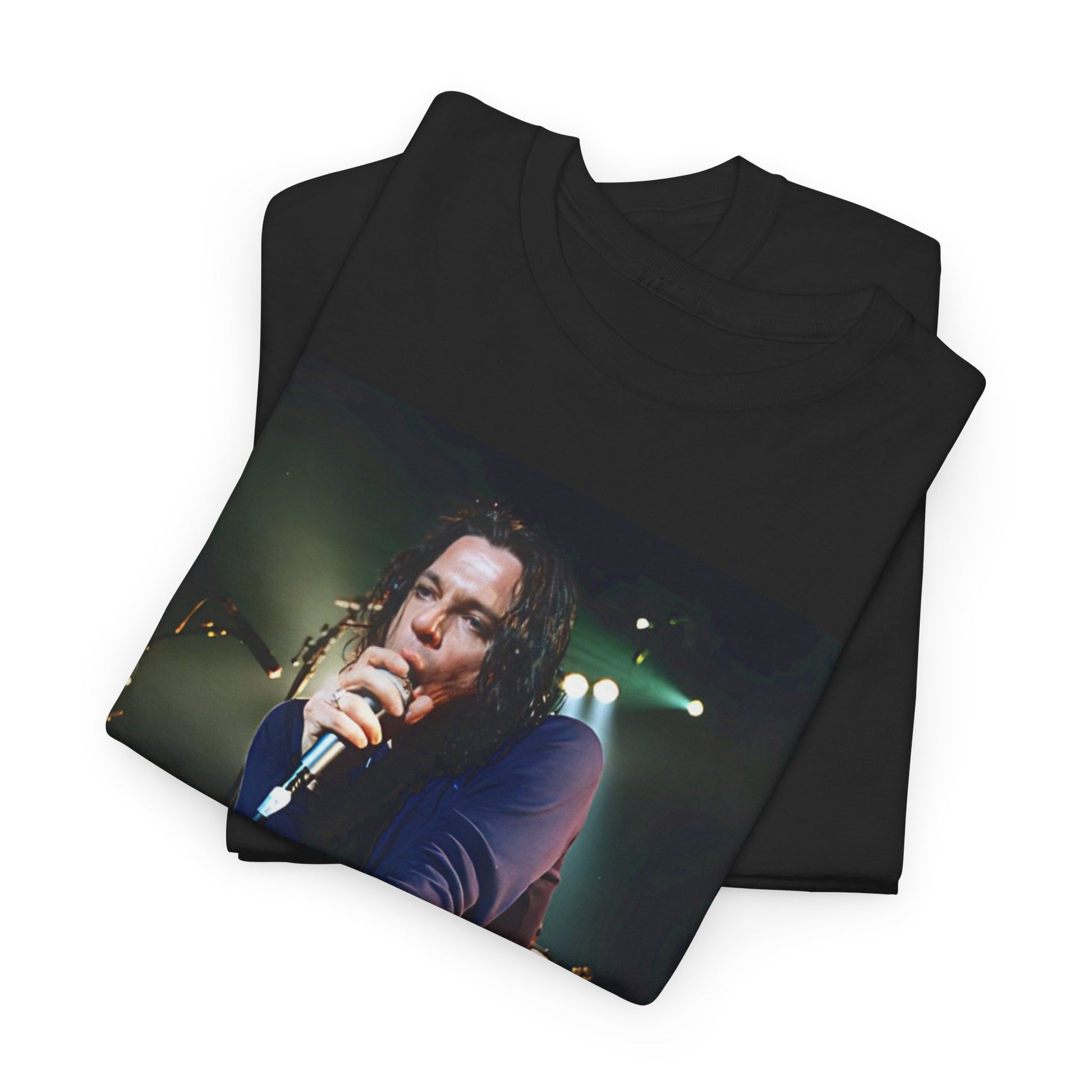 A black graphic t-shirt featuring a graphic related to INXS's 'Elegantly Wasted' album era.