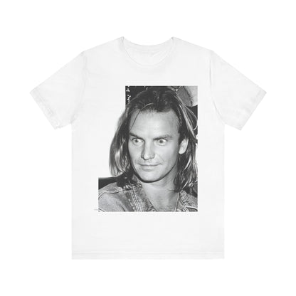 A black graphic t-shirt featuring a retro graphic related to Sting's 'Synchronicity' album era.
