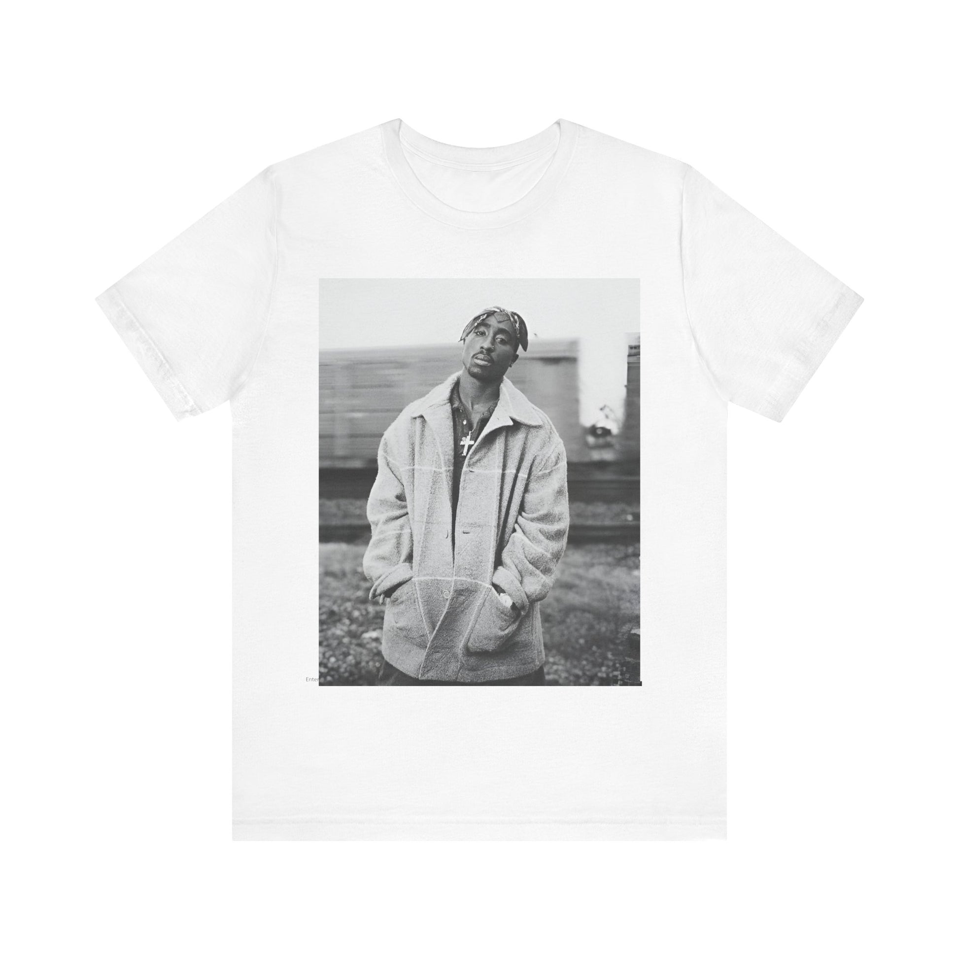 A black graphic t-shirt featuring a graphic related to Tupac's 'Thug Life' philosophy.