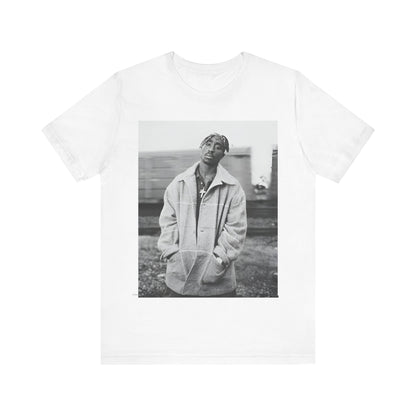 A black graphic t-shirt featuring a graphic related to Tupac's 'Thug Life' philosophy.
