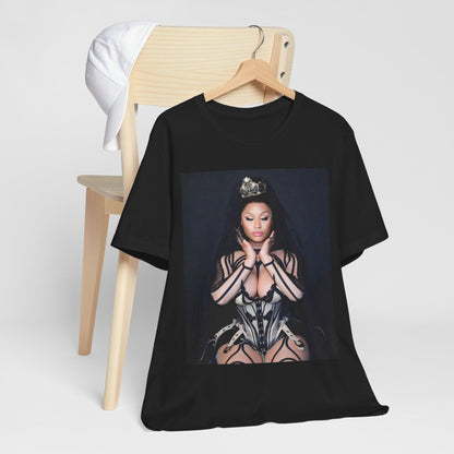 A black graphic t-shirt featuring a vintage graphic of Nicki Minaj as the Queen of Rap.