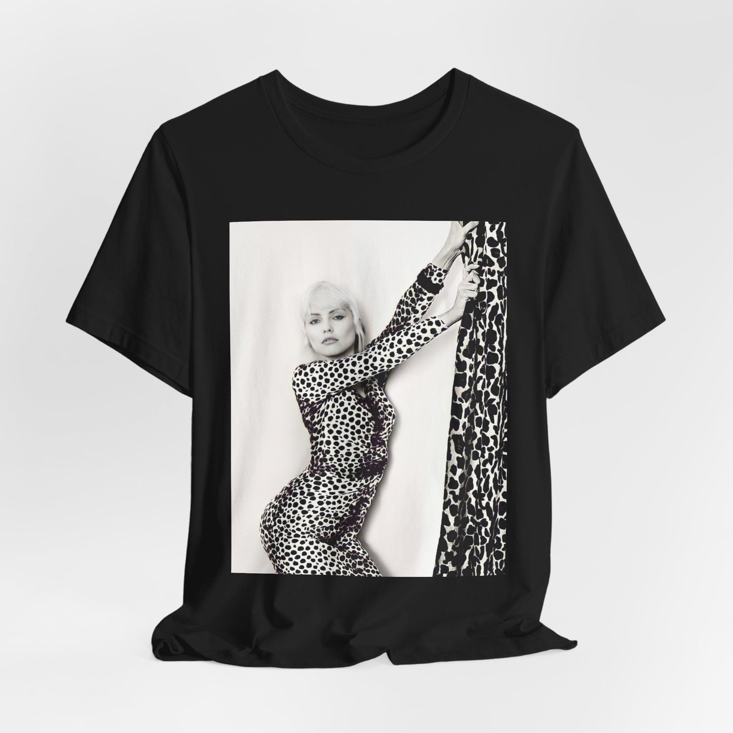 A black graphic t-shirt featuring a black and white, wild-style graphic of Blondie, emphasizing their untamed spirit.