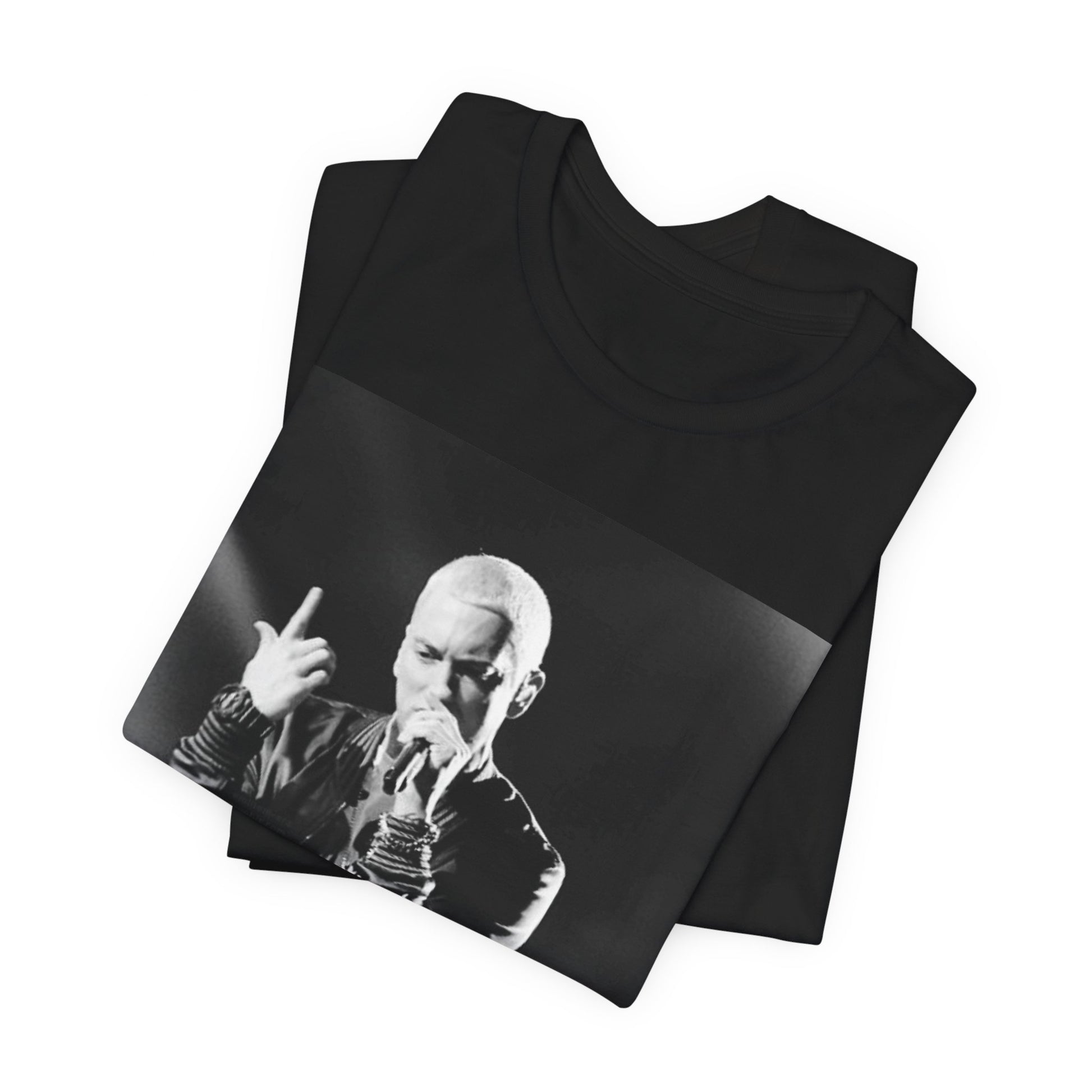 A black graphic t-shirt featuring a graphic or photo of Eminem performing live on stage.