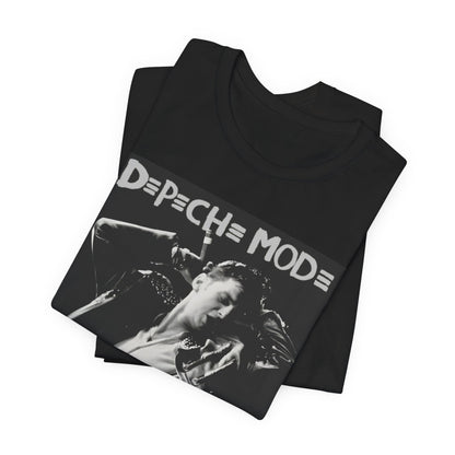 A black graphic t-shirt featuring a black and white graphic or photo of Depeche Mode performing live on stage.