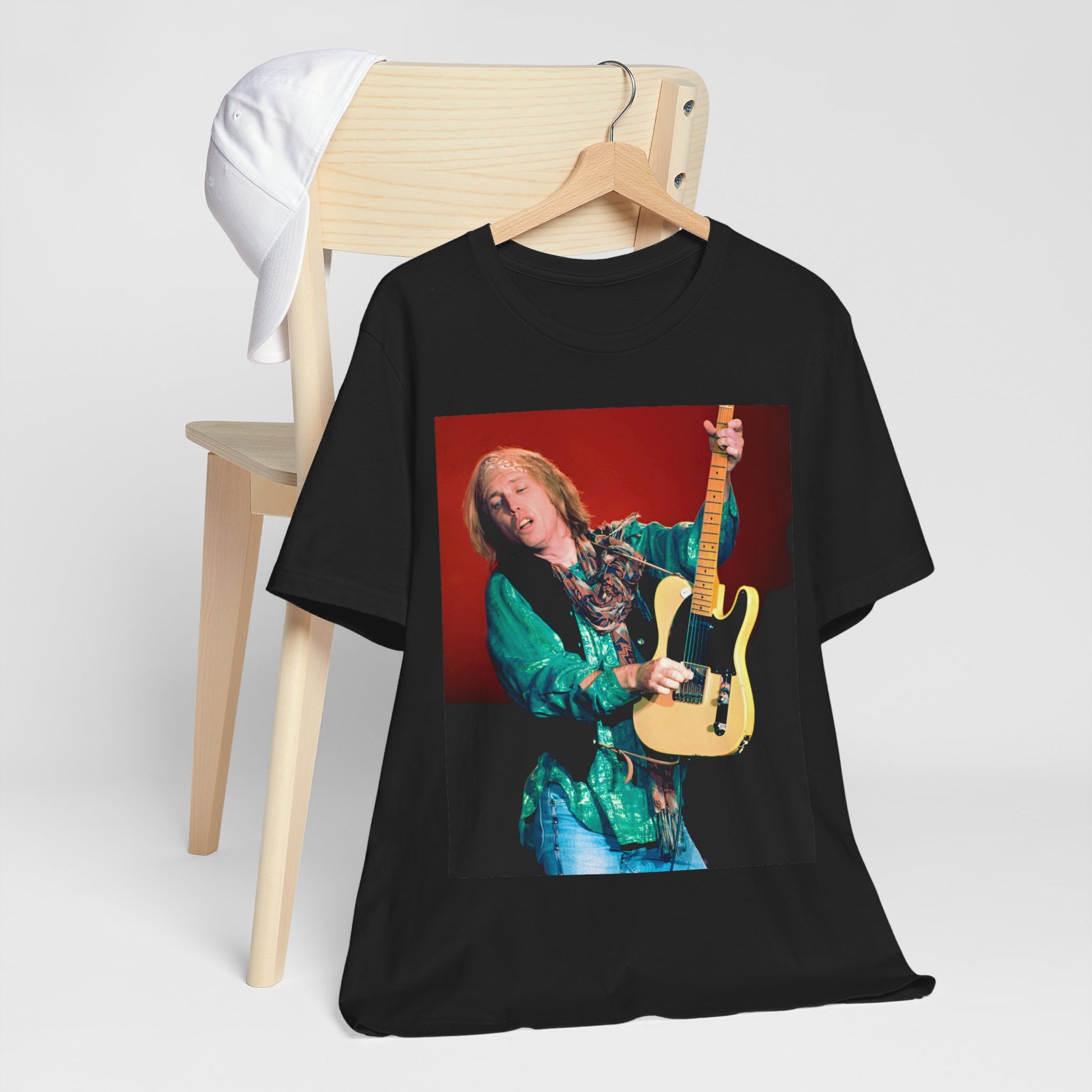 A black graphic t-shirt featuring a graphic related to Tom Petty's 'Free Fallin'' song or era concert.