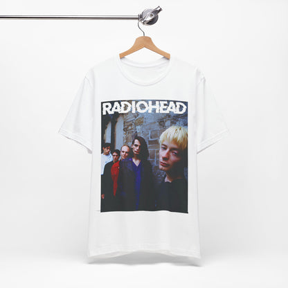 A black graphic t-shirt featuring a 90s graphic related to Radiohead's 'Karma Police' song or era.