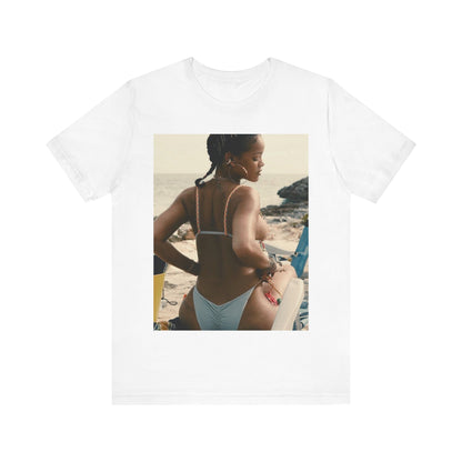A black graphic t-shirt featuring a graphic of Rihanna as a bikini babe in paradise.