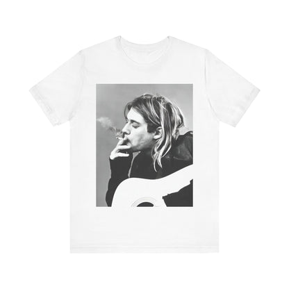 A black graphic t-shirt featuring a vintage photo of a Nirvana member with a cigarette.