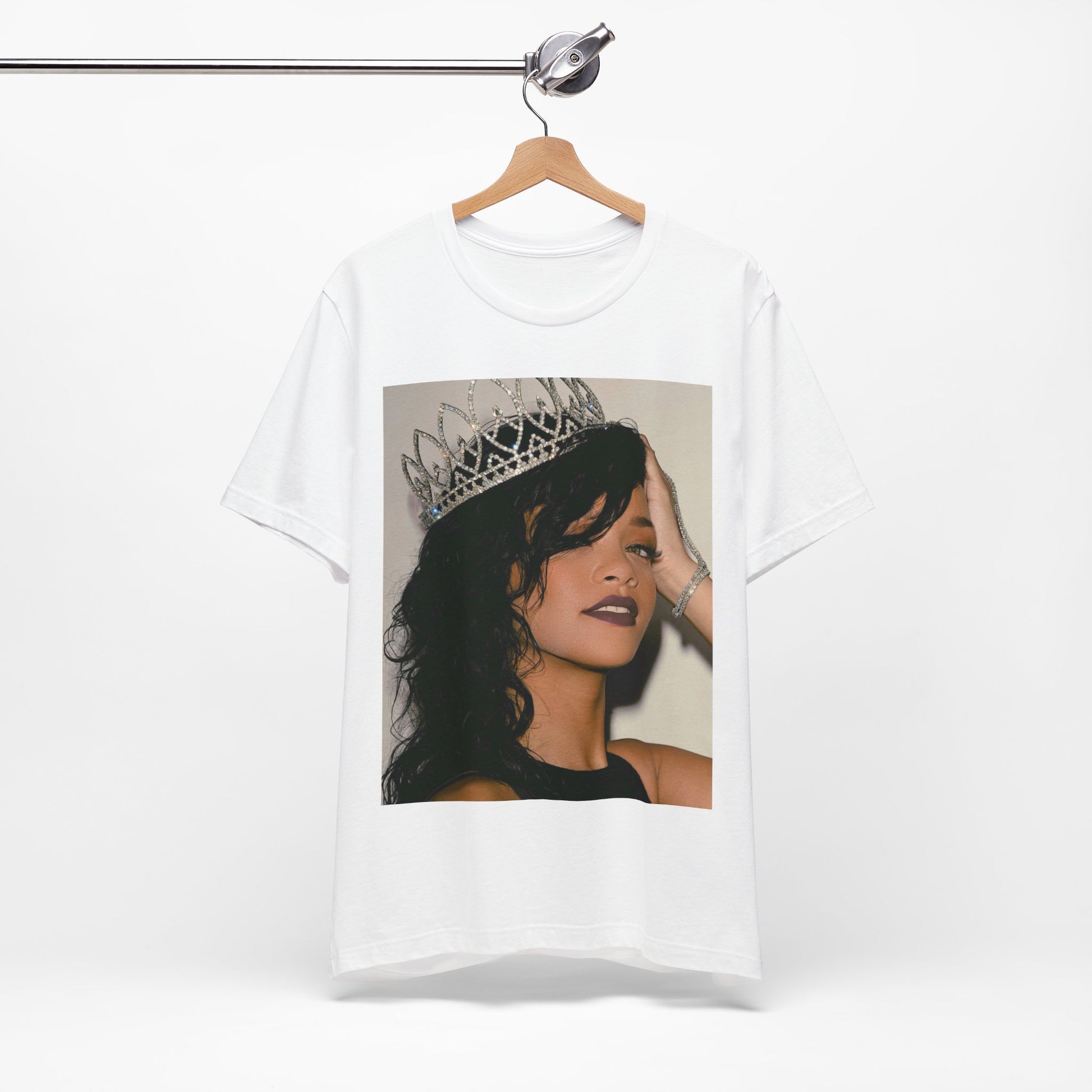 A black graphic t-shirt featuring a Y2K pop aesthetic graphic of Rihanna.