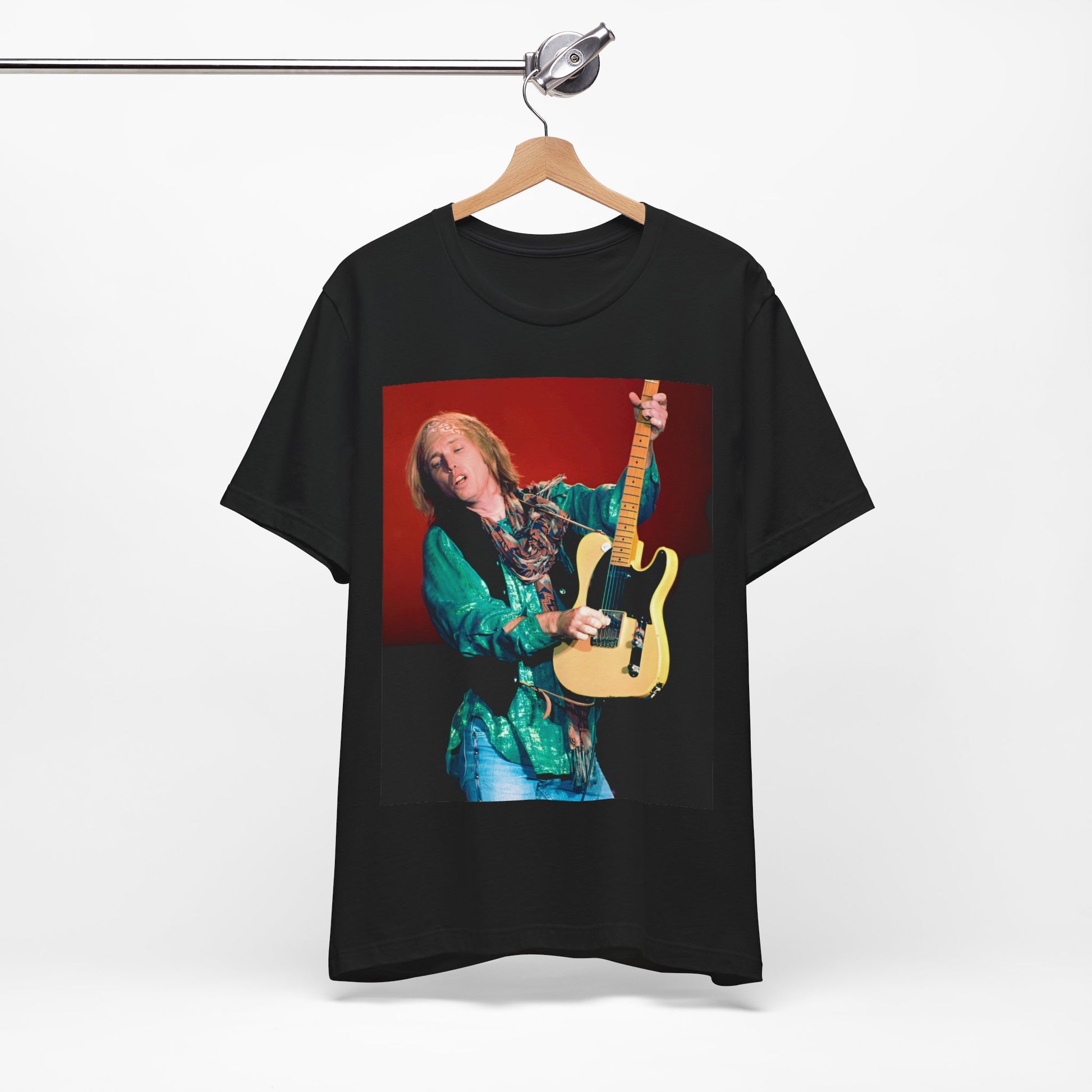A black graphic t-shirt featuring a graphic related to Tom Petty's 'Free Fallin'' song or era concert.