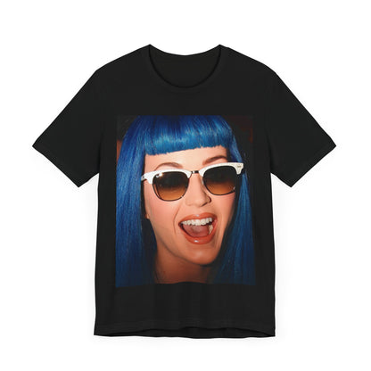 A black graphic t-shirt featuring a retro graphic of Katy Perry with blue hair.