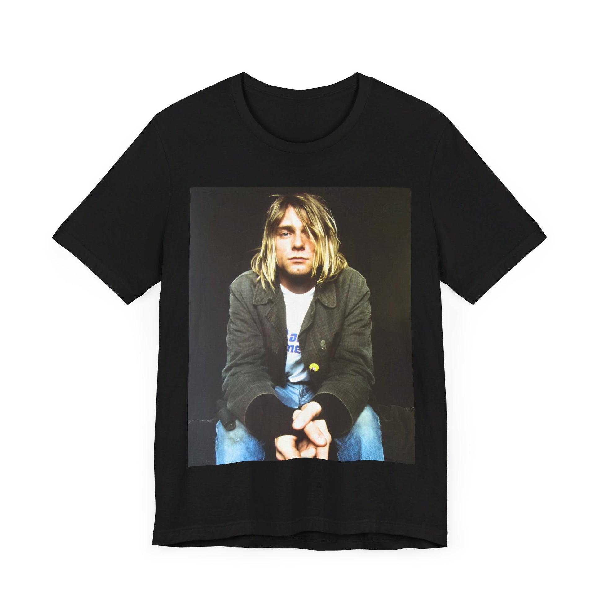 A black graphic t-shirt featuring an iconic graphic of Kurt Cobain from Nirvana.
