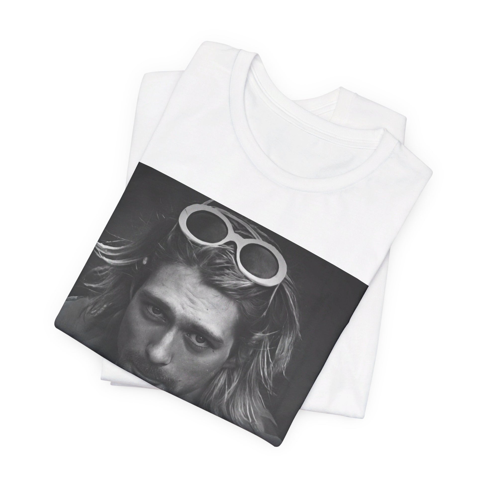 A black graphic t-shirt featuring a photo of Kurt Cobain from Nirvana wearing sunglasses.