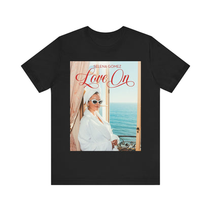 A black graphic t-shirt featuring a graphic related to Selena Gomez's 'Love On' song.