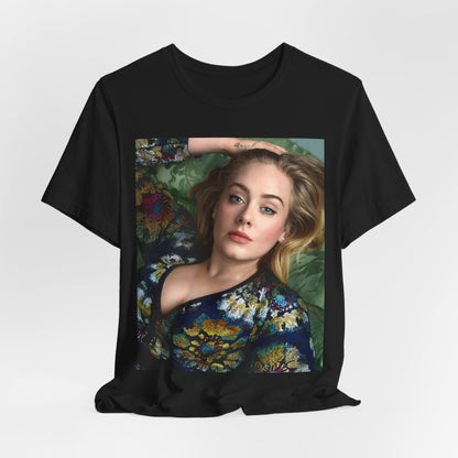 A black graphic t-shirt featuring a photo of Adele, possibly with floral elements or a floral background, showing a serene or contemplative expression.