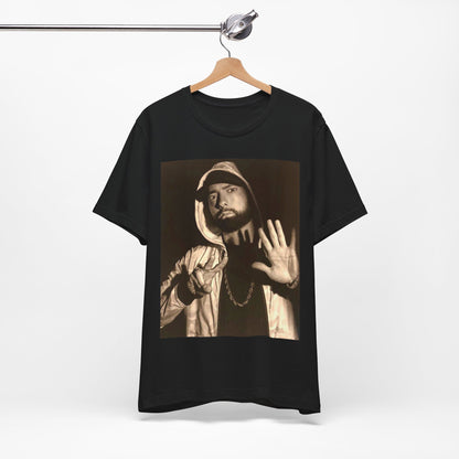 A black graphic t-shirt featuring a graphic of Eminem as an authentic underground rap icon.