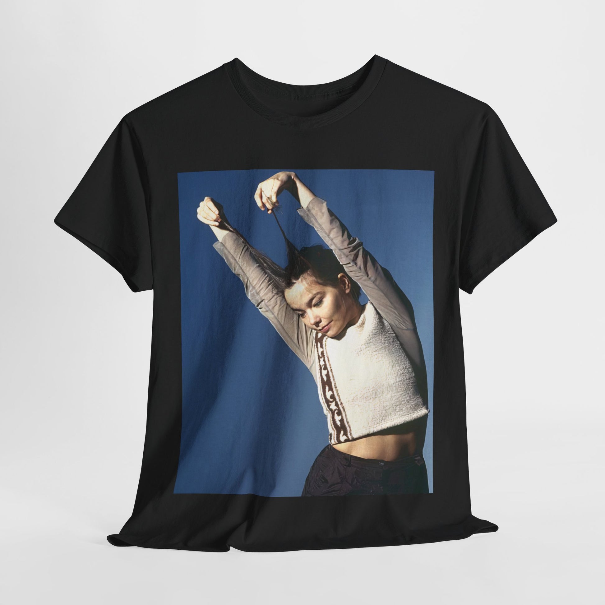 A black graphic t-shirt featuring a graphic of Bjork, designed with a futuristic or timeless aesthetic, labeling it a 'future classic'.