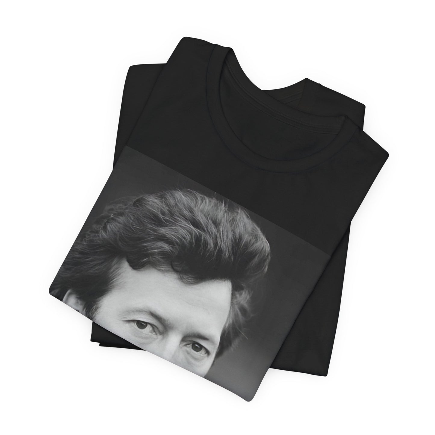 A black graphic t-shirt featuring a 70s rock aesthetic graphic of Eric Clapton.