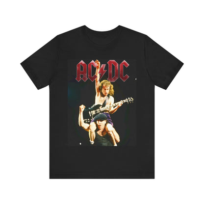 A black graphic t-shirt depicting AC/DC's Angus Young playing guitar while riding on the shoulders of Bon Scott, evocative of their "Highway to Hell" tour performances.