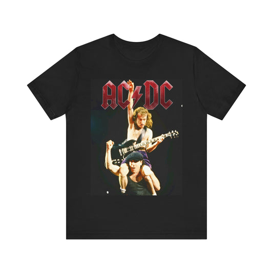 A black graphic t-shirt depicting AC/DC's Angus Young playing guitar while riding on the shoulders of Bon Scott, evocative of their "Highway to Hell" tour performances.