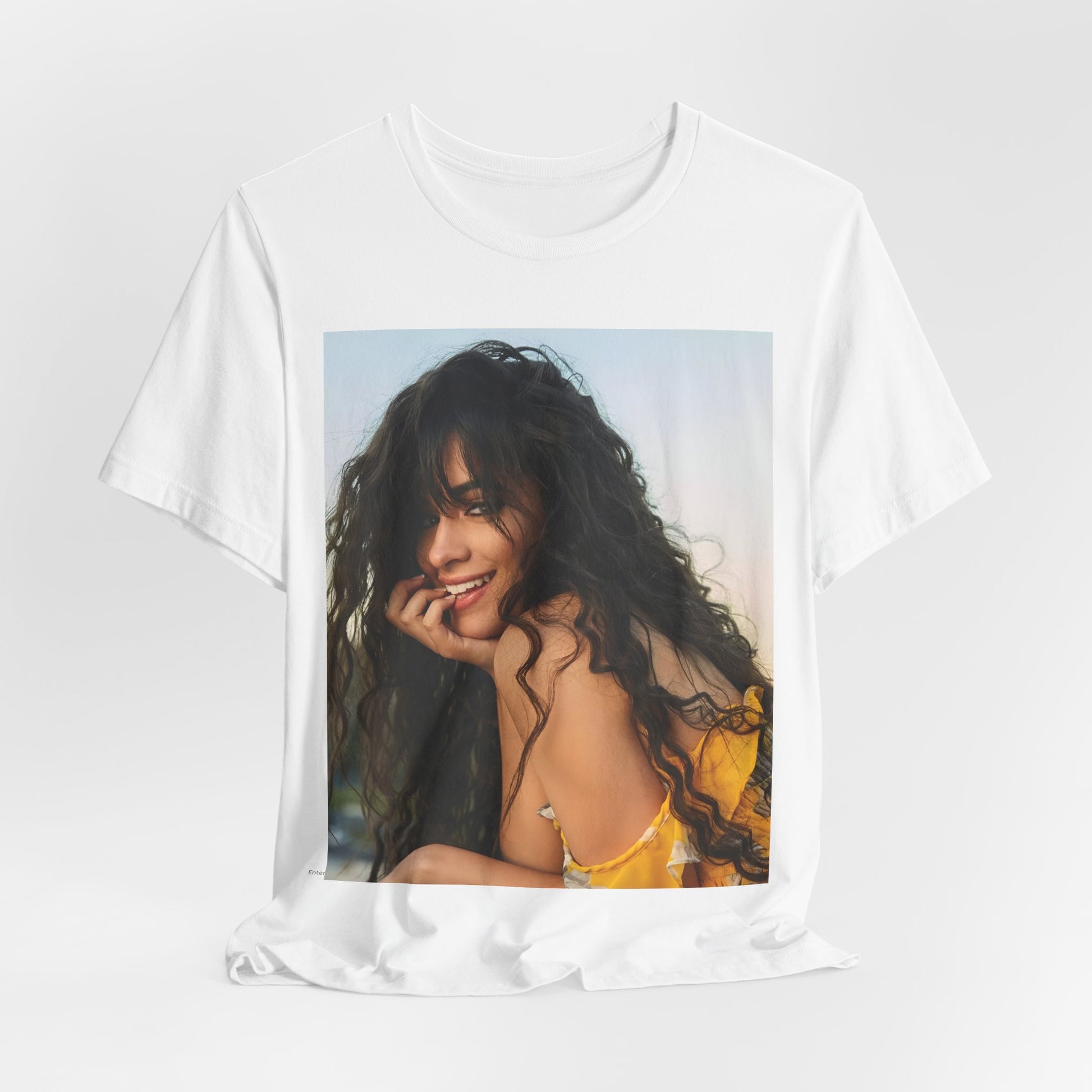 A black graphic t-shirt featuring a graphic inspired by Camila Cabello's "Don't Go Yet" song or era.