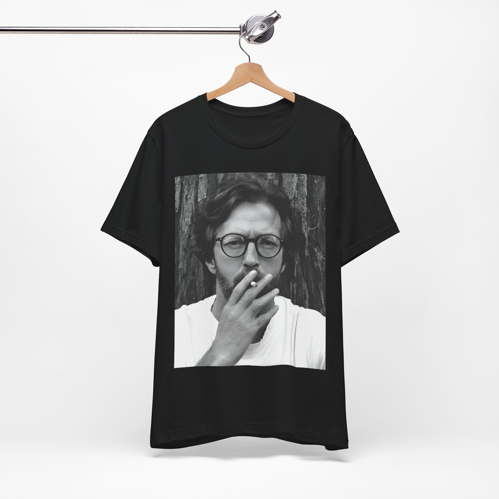 A black graphic t-shirt featuring a graphic related to Eric Clapton's classic Cream era.