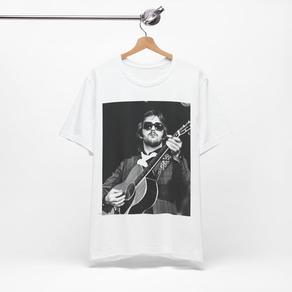 A black graphic t-shirt featuring a graphic of Eric Clapton with a chill blues rock vibe.