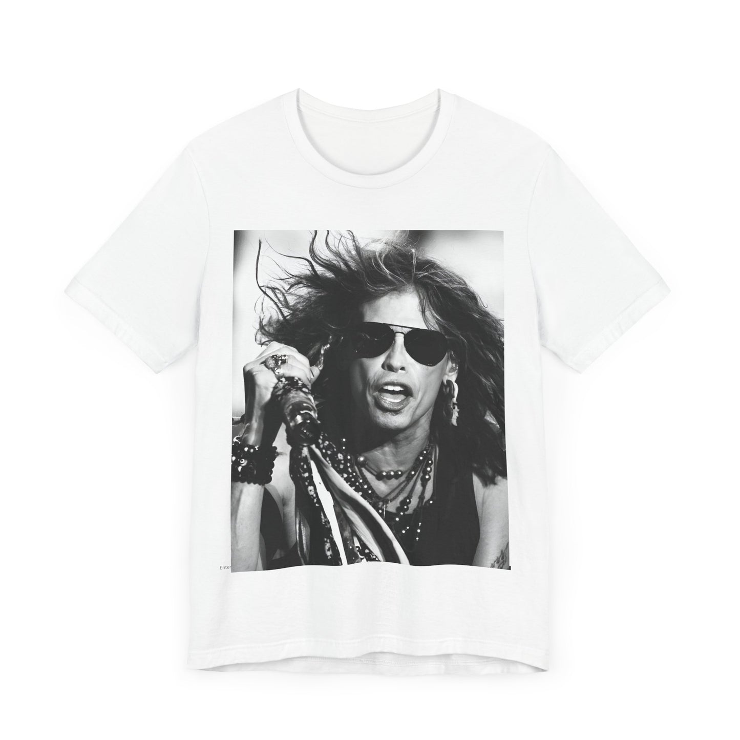 A black graphic t-shirt featuring a black and white photo of Aerosmith's Steven Tyler with his signature scarf and microphone, captured during a dynamic performance.