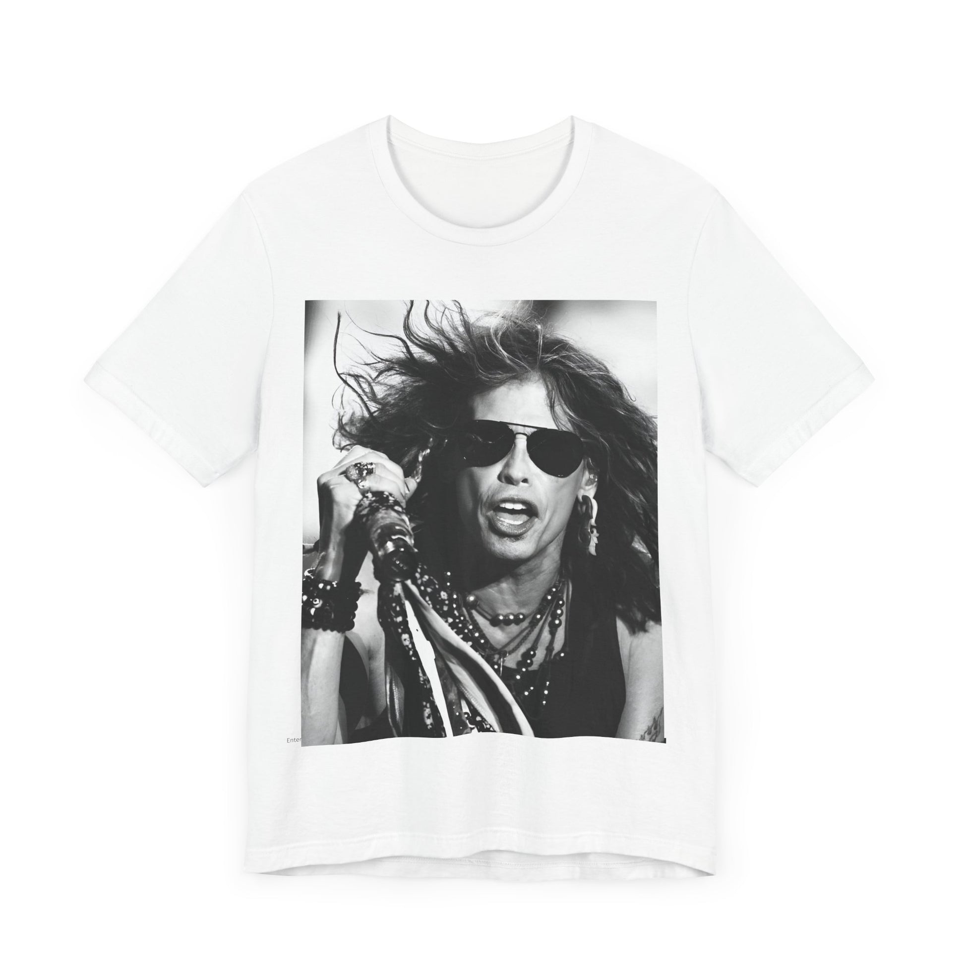 A black graphic t-shirt featuring a black and white photo of Aerosmith's Steven Tyler with his signature scarf and microphone, captured during a dynamic performance.
