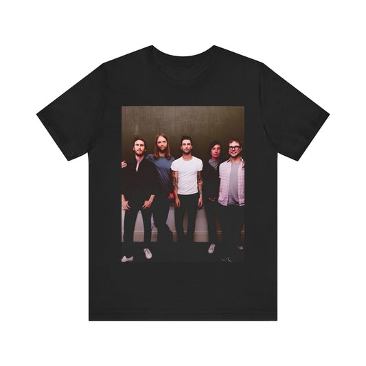 A black cotton Maroon 5 t-shirt featuring a graphic of an artistic, emotional heart design.