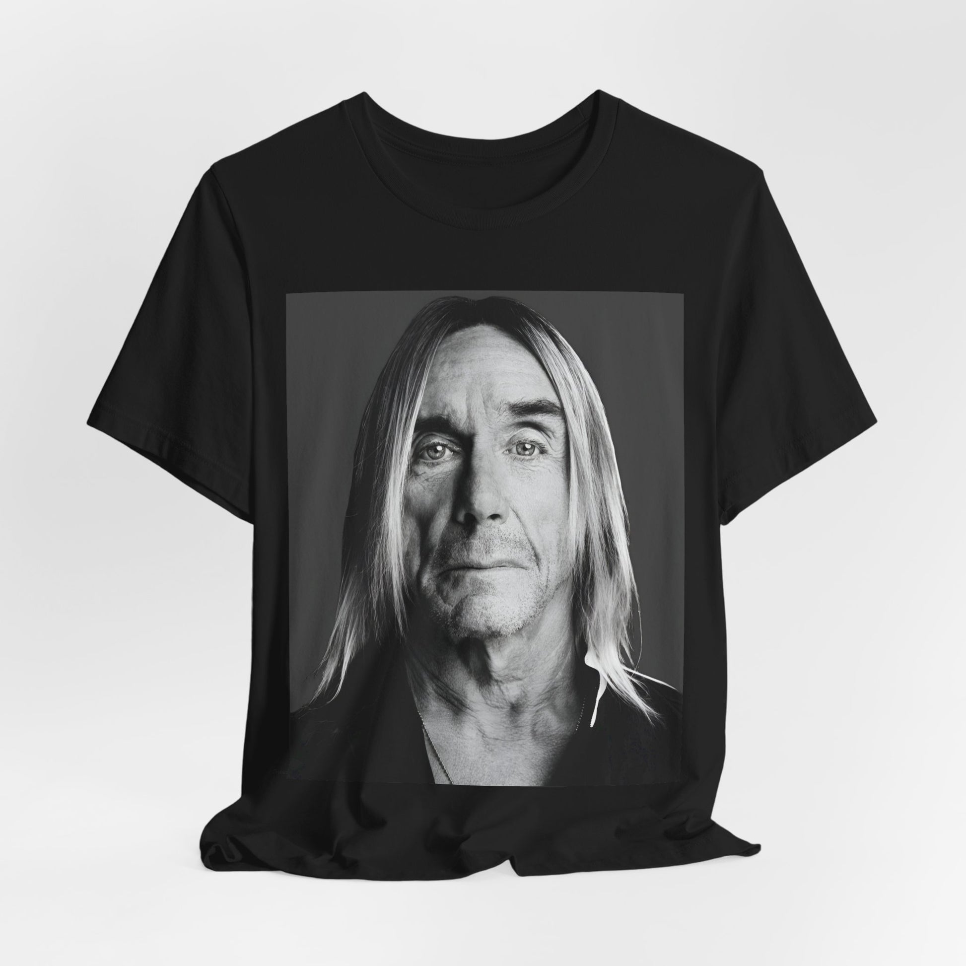 A black graphic t-shirt featuring a black and white portrait photo of Iggy Pop.