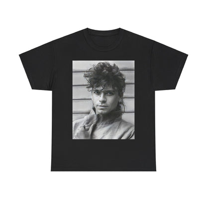 A black graphic t-shirt featuring a retro black and white graphic or photo of Michael Hutchence from INXS.