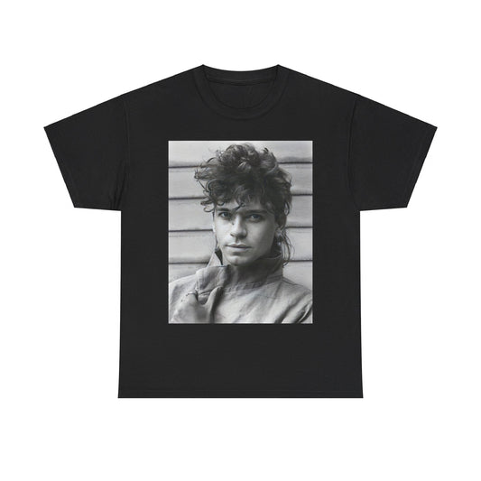 A black graphic t-shirt featuring a retro black and white graphic or photo of Michael Hutchence from INXS.
