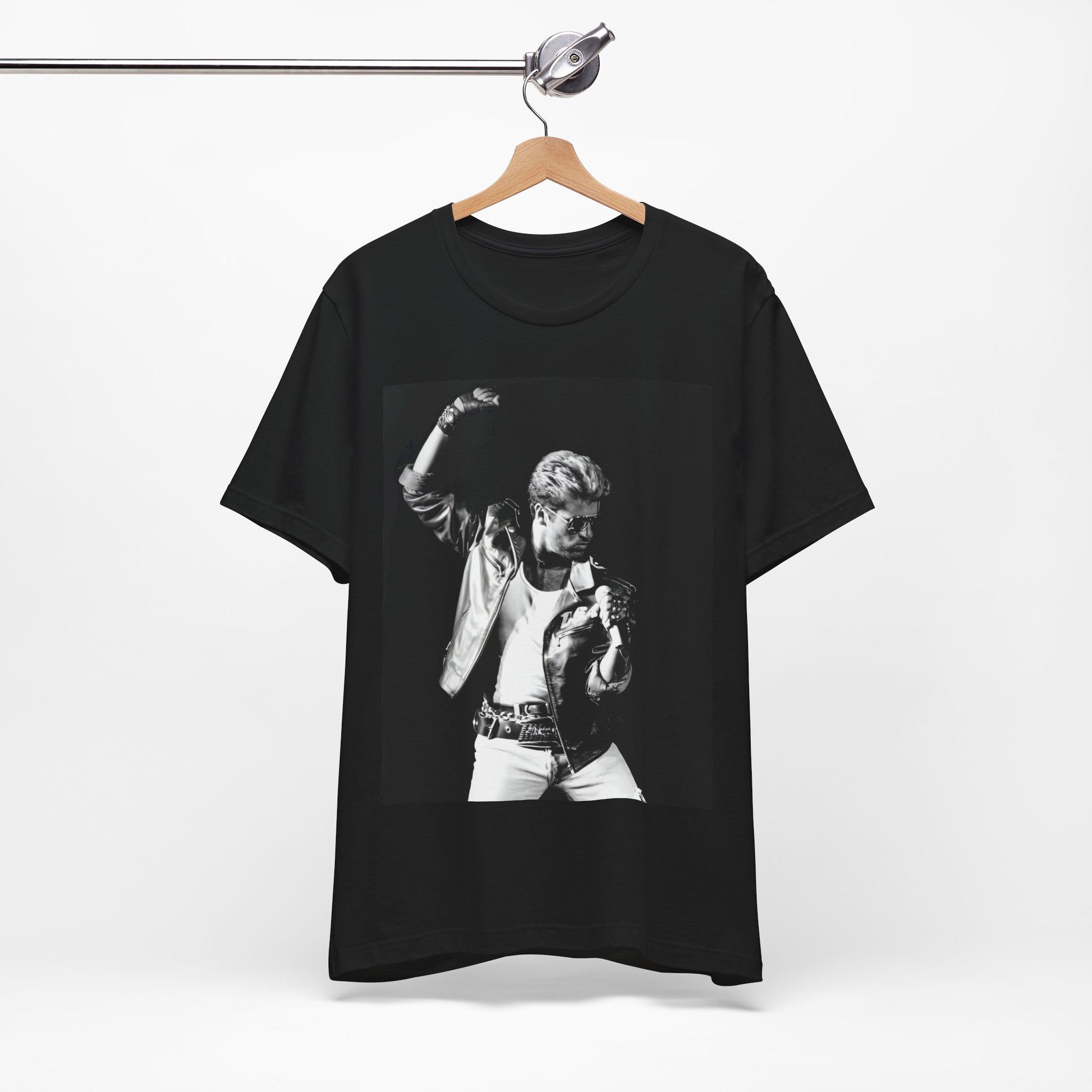 A black graphic t-shirt featuring an iconic black and white portrait photo of George Michael.