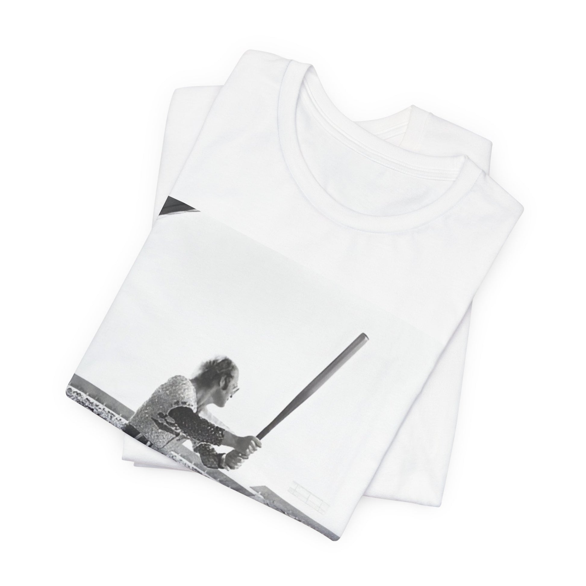 A black graphic t-shirt featuring a black and white graphic or photo related to Elton John's 1975 tour in America.