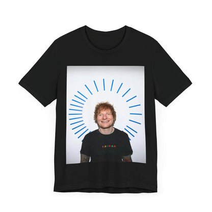 A black graphic t-shirt featuring a classic photo portrait of Ed Sheeran in a folk-pop style.