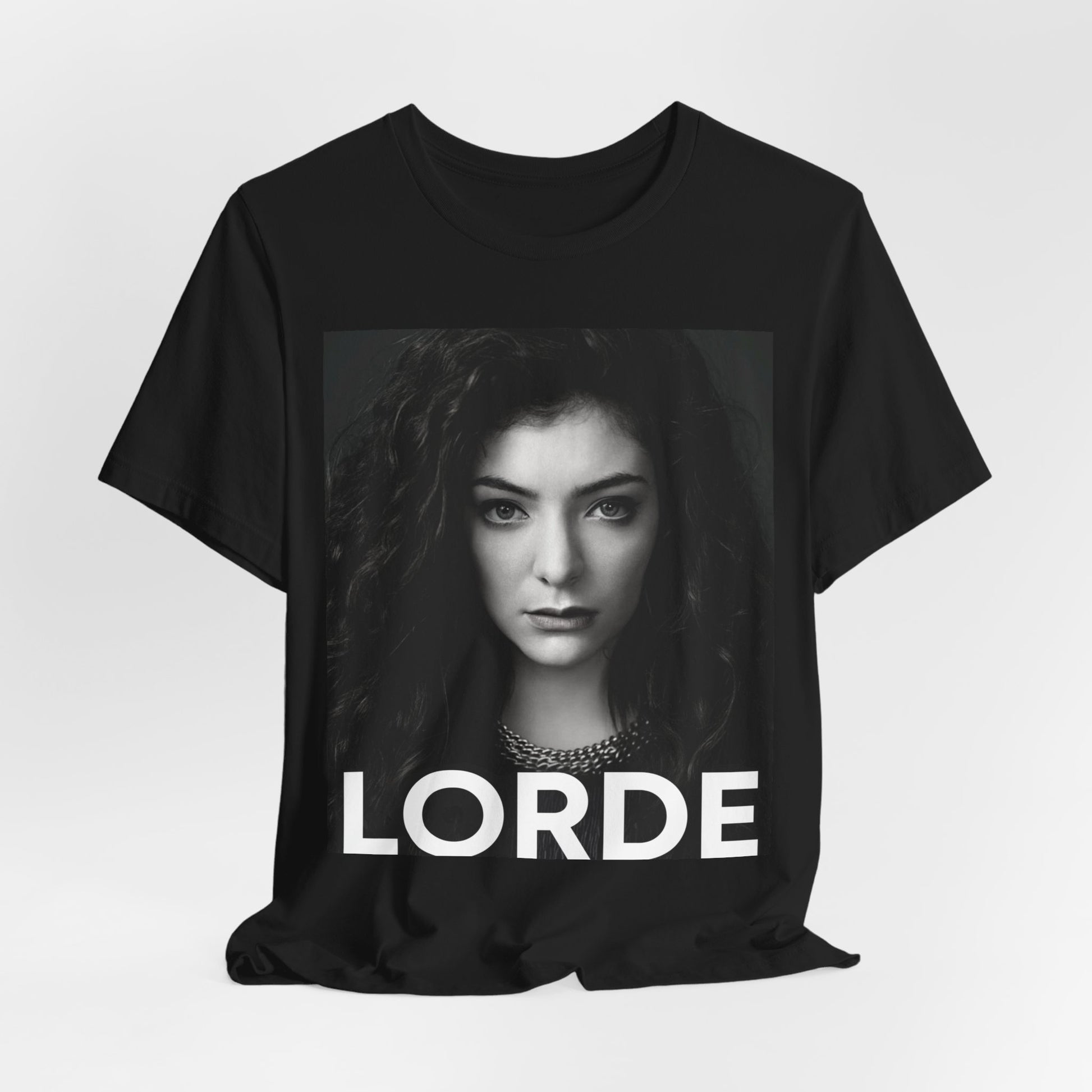 A black graphic t-shirt featuring a casual pop fan graphic of Lorde.