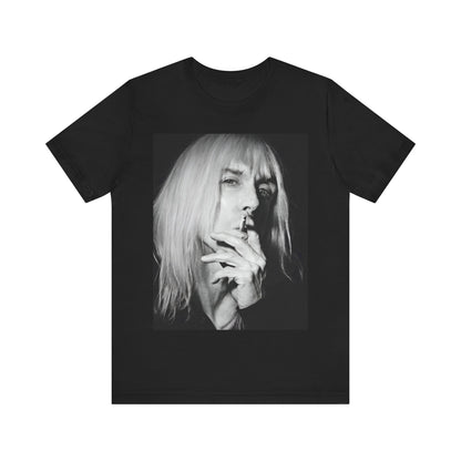 A black graphic t-shirt featuring a black and white graphic or photo of Iggy Pop holding a cigar.