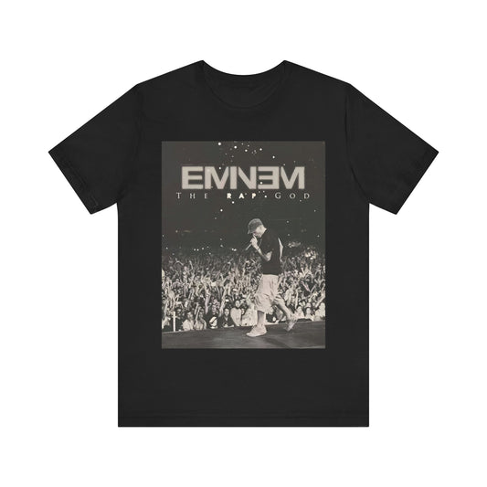 A black graphic t-shirt featuring a graphic or photo of Eminem performing live on tour.