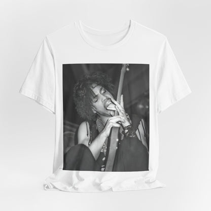 A black graphic t-shirt featuring a graphic or photo of Prince performing wildly on stage.