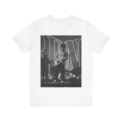 A black graphic t-shirt featuring a black and white photo of Bruno Mars performing live on stage.
