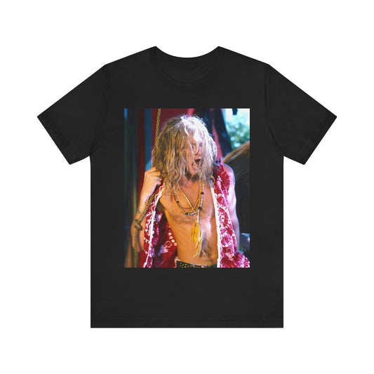 A black graphic t-shirt featuring a dynamic and 'wild' tour graphic of Alice In Chains from the 1990s, depicting chaotic live energy.