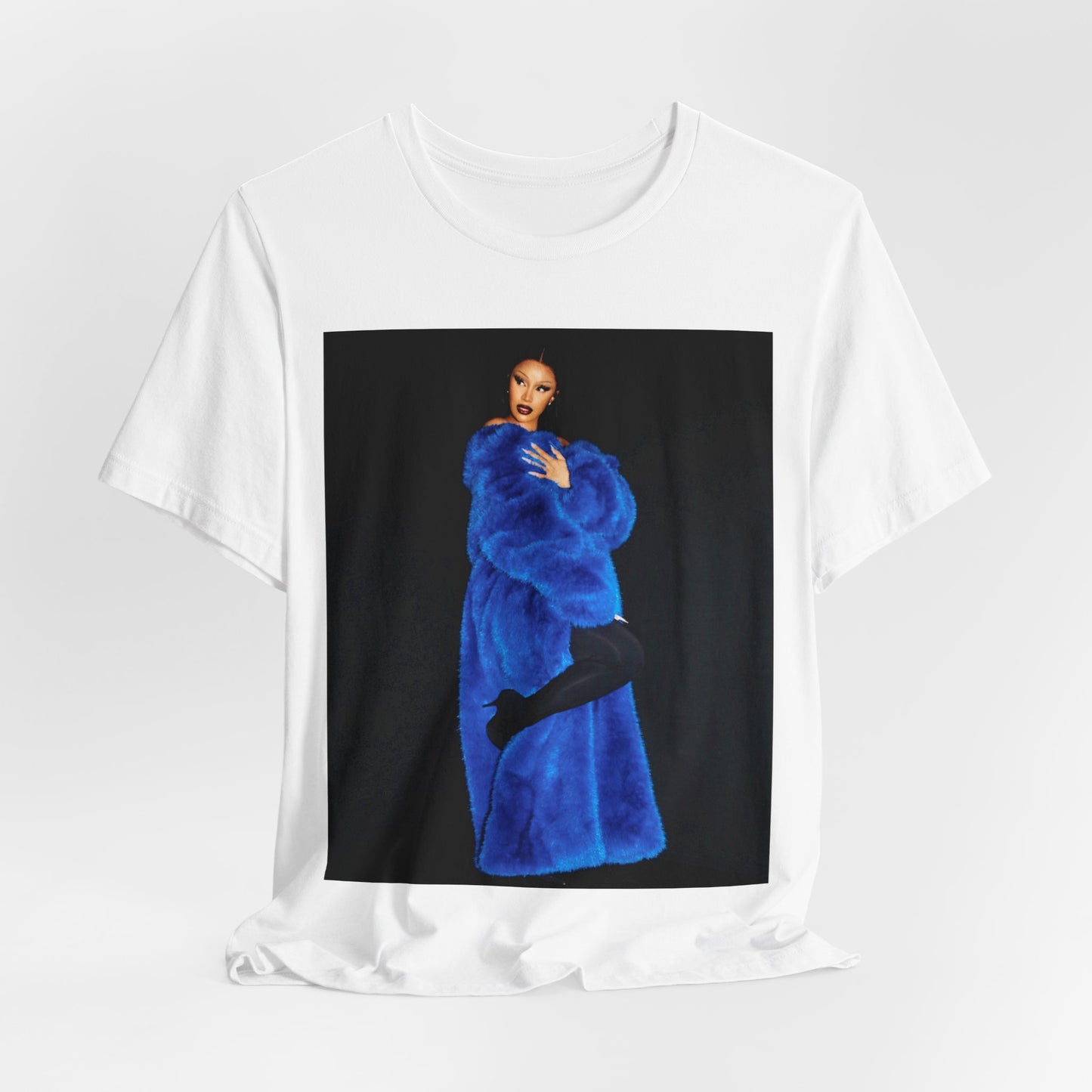 A black graphic t-shirt featuring a photo of Cardi B, possibly with blue velvet elements or a luxurious blue aesthetic.