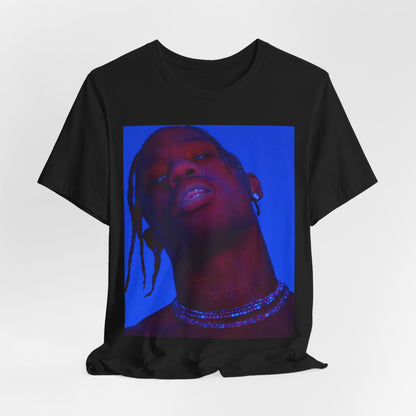 A black graphic t-shirt featuring a bold graphic of Travis Scott as a rap superstar.