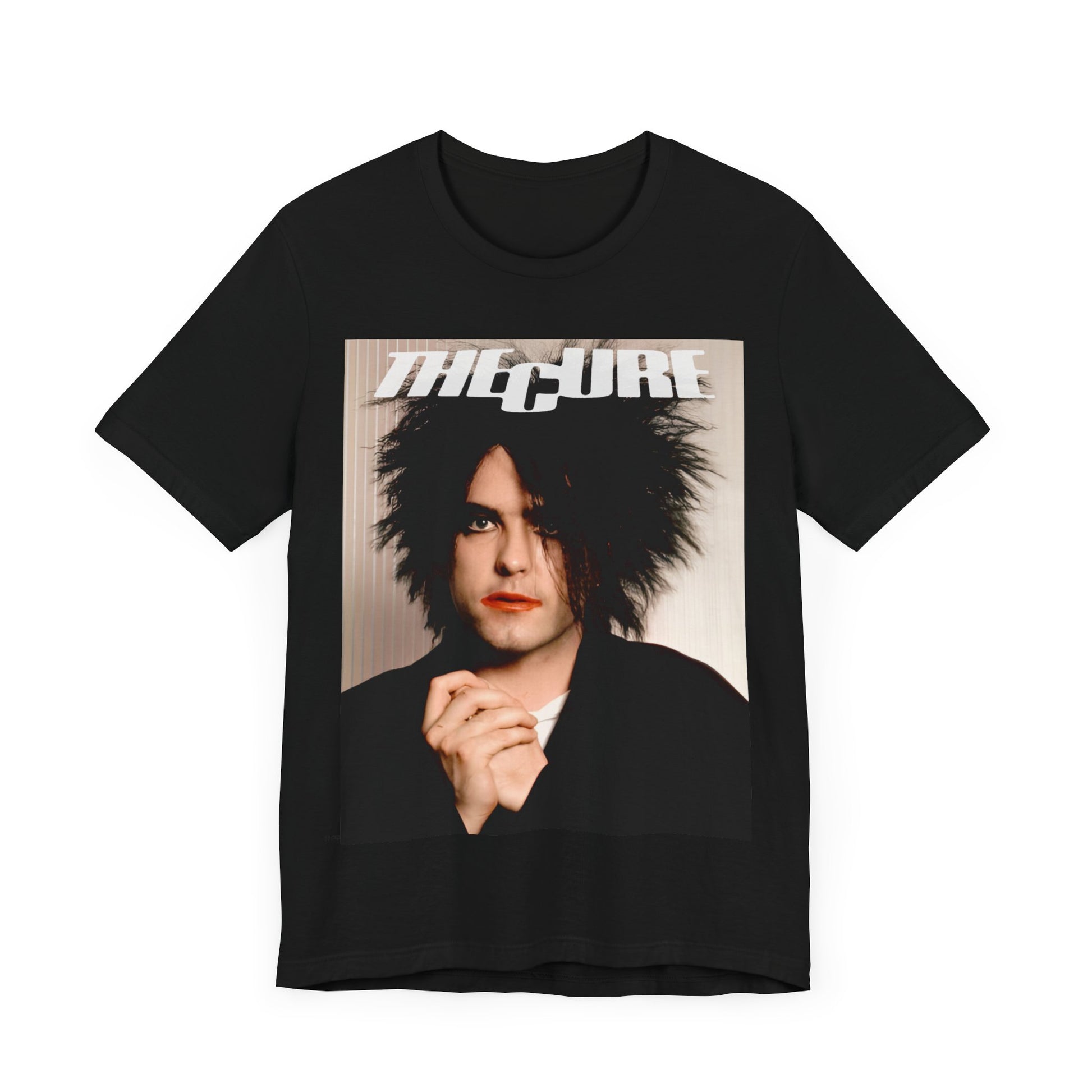 A black graphic t-shirt featuring a 90s portrait photo of Robert Smith from The Cure.