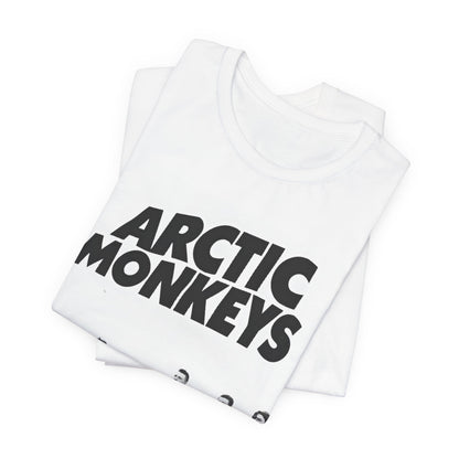 A black graphic t-shirt featuring the Arctic Monkeys logo in black and white.